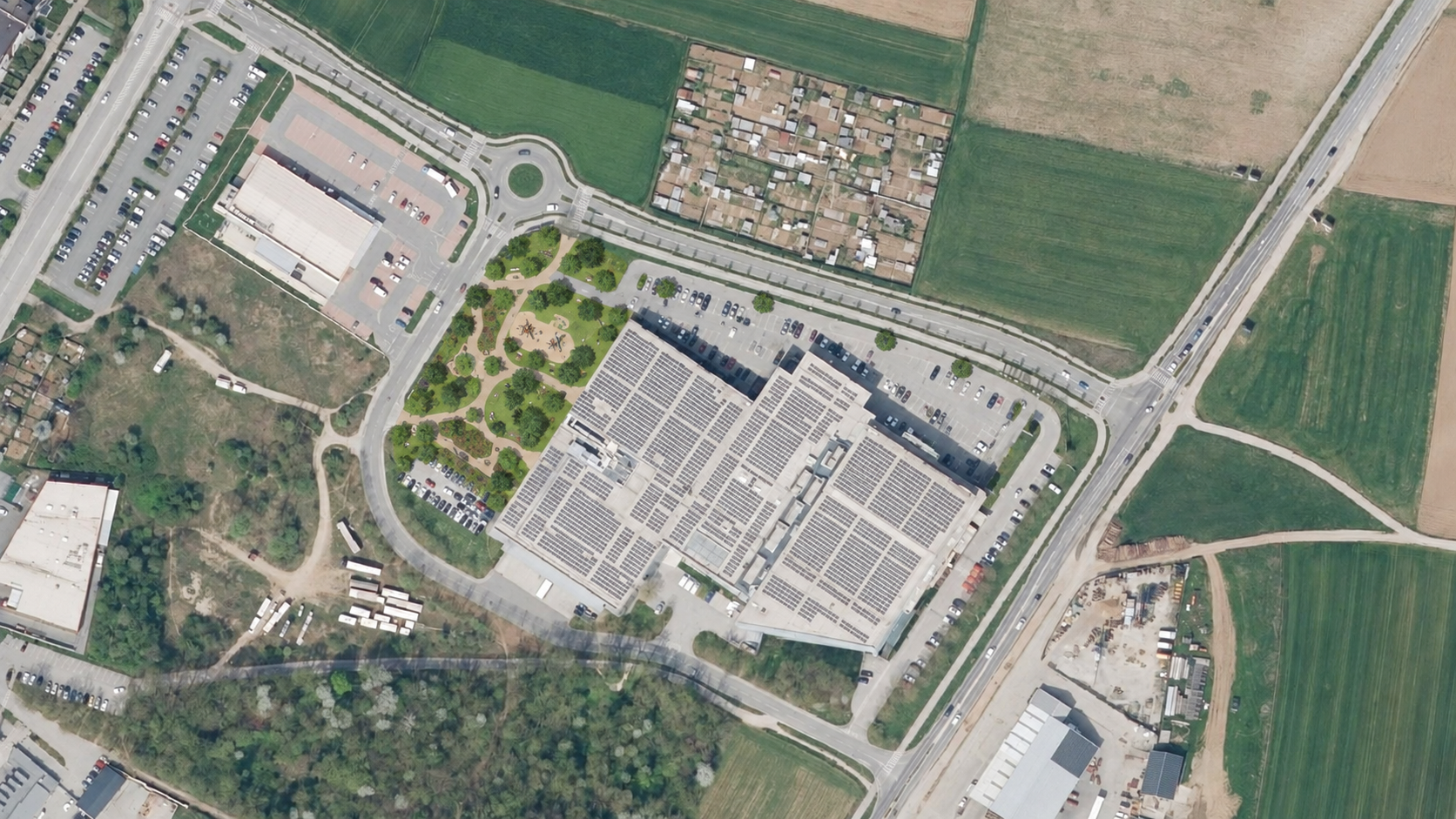 Koncept zelenega parka na delu parkirišča Planet Kranj